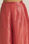 Shop_Urvashi Kaur_Coral Striped Tissue Silk Wide Legged Pant  _Online_at_Aza_Fashions