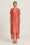 Urvashi Kaur_Coral Chanderi Silk Woven Stripe Round Tunic _at_Aza_Fashions