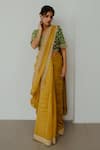 Buy_WABI SABI BY ANSHUM-RITESH_Yellow Chanderi Hand Embroidered Dori Round Genda Saree With Blouse _at_Aza_Fashions