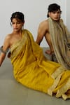 Buy_WABI SABI BY ANSHUM-RITESH_Yellow Chanderi Hand Embroidered Dori Round Genda Saree With Blouse _Online_at_Aza_Fashions