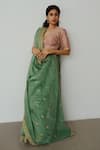 Shop_WABI SABI BY ANSHUM-RITESH_Green Chanderi Hand Embroidered Dori V Neck Anchovies Saree With Blouse_at_Aza_Fashions