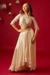 Buy_Decemberbyvivek_Ivory Net Hand Embroidered Top And Skirt Set _at_Aza_Fashions