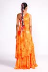 Shop_Isha Gupta Tayal_Orange Crepe Print Floral Asymmetric Neck Tunic And Sharara Set _at_Aza_Fashions