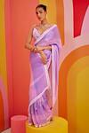 Buy_Isha Gupta Tayal_Purple Satin Printed Striped Deep V Neck Saree With Blouse _at_Aza_Fashions