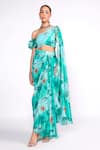 Buy_Isha Gupta Tayal_Green Crepe Printed Floral Asymmetric Neck Draped Top And Skirt Set _at_Aza_Fashions