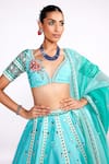 Isha Gupta Tayal_Green Silk Printed Abstract Deep V Neck Embroidered Blouse And Kalidar Lehenga Set _at_Aza_Fashions