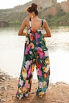 Shop_Ruhr India_Green Crepe Printed Botanical V Neck Flared Jumpsuit _at_Aza_Fashions