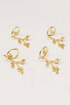 Shop_Elm & Oak_Gold Brass Leaf Shape Napkin Rings Set Of 4_at_Aza_Fashions