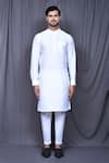 Buy_Aryavir Malhotra_Blue Art Silk Embroidered Floral Nehru Jacket And White Kurta Set _Online_at_Aza_Fashions