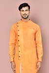 Shop_Arihant Rai Sinha_Orange Cotton Plain Asymmetric Hem Kurta With Dhoti Pant _Online_at_Aza_Fashions