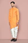 Arihant Rai Sinha_Orange Cotton Plain Asymmetric Hem Kurta With Dhoti Pant _at_Aza_Fashions