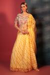 Buy_Bandhani_Yellow Silk Embroidery, Mirrors V-neck Leheriya Pattern Skirt Blouse Set_at_Aza_Fashions