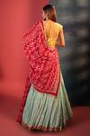 Shop_Bandhani_Blue Silk Embroidery Bandeau Neck Stripe Pattern Lehenga Set _at_Aza_Fashions