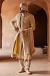 Buy_Nitika Gujral_Gold Raw Silk Embroidered Resham Sherwani With Kalidar Kurta Set  _at_Aza_Fashions