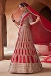 Shop_Nitika Gujral_Red Raw Silk Embroidery Zardozi V Neck Bridal Lehenga Set  _Online_at_Aza_Fashions