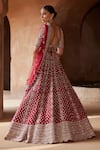 Shop_Nitika Gujral_Maroon Raw Silk Embroidered Zardozi Deep V Floral Bridal Lehenga Set  _at_Aza_Fashions