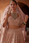 Shop_Nitika Gujral_Pink Raw Silk Embellished Applique Leaf Neck Floral Bridal Lehenga Set _Online_at_Aza_Fashions