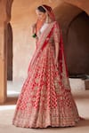 Buy_Nitika Gujral_Red Raw Silk Embroidered Zari Deep Leaf Neck Vintage Bridal Lehenga Set _Online_at_Aza_Fashions