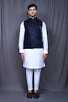 Aryavir Malhotra_Blue Satin Silk Embroidered Thread Nehru Jacket And Kurta Set _at_Aza_Fashions