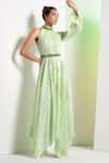 Buy_Mandira Wirk_Green Shimmer Lycra Textured And Embroidered Pleated Metallic Asymmetric Dress_Online_at_Aza_Fashions