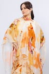 Shop_Mandira Wirk_Yellow Chiffon Printed And Embroidered Abstract Apricot Crush Layered Dress_at_Aza_Fashions
