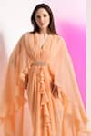 Shop_Mandira Wirk_Peach Georgette Embroidered Beads Deep V Neck Pleated Draped Cape Sleeve Dress_at_Aza_Fashions