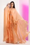 Mandira Wirk_Peach Georgette Embroidered Beads Deep V Neck Pleated Draped Cape Sleeve Dress_at_Aza_Fashions