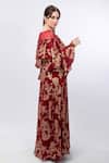 Shop_Mandira Wirk_Red Brasso Embossed Floral Round Ruffle Shoulder Detail Dress_Online_at_Aza_Fashions
