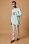 Buy_BUBBER COUTURE_Blue Cotton Silk Plain Sid Pintucked Mandarin Collar Kurta _at_Aza_Fashions