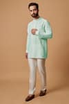 Buy_BUBBER COUTURE_Green Cotton Silk Plain Ryan Pintucked Mandarin Collar Kurta _at_Aza_Fashions