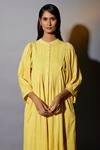 Buy_JAYATI GOENKA_Yellow Cotton Cut Work Round Neck Pleated Plain Anarkali And Trouser Set _Online_at_Aza_Fashions