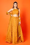 Buy_SAMMOHI BY MOKSHA AND HIRAL_Yellow Lehenga With Blouse Organza Print Chevron Halter Neck Clara Set_at_Aza_Fashions