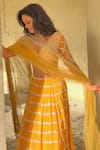 Buy_Irrau by Samir Mantri_Yellow Net Embroidered Thread Work V Neck Stripe Lehenga Set 