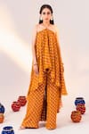 Buy_SILKY BINDRA_Yellow Georgette Woven Geometric Halter Neck Pattern High-low Tunic With Pant _at_Aza_Fashions