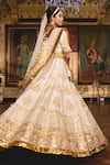 Shop_Gulabo Jaipur_White Muslin Gota Patti, Pearls, Gulnoor Mughal Embroidered Bridal Lehenga Set _at_Aza_Fashions