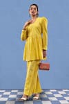 Buy_AFFROZ_Yellow Cotton Jacquard Solid Glass Neck Peplum Top And Bell-bottom Pant Set _Online_at_Aza_Fashions