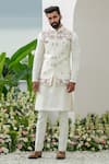 Buy_Amrit Dawani_Ivory Cotton Silk Embroidered Thread Floral Bundi Kurta Set_at_Aza_Fashions