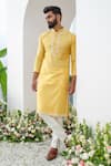 Shop_Amrit Dawani_Yellow Kurta Cotton Blend Embroidered Thread Placed Cutdana With Trouser_Online_at_Aza_Fashions