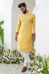 Amrit Dawani_Yellow Kurta Cotton Blend Embroidered Thread Placed Cutdana With Trouser_at_Aza_Fashions