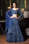 Shop_Midushi Bajoria_Blue Tulle Embroidered Cutdana Boat Floral Embellished Bridal Lehenga Set _at_Aza_Fashions