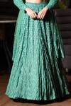 Buy_Midushi Bajoria_Green Georgette, Tulle Sequins, Cut Work V-neck Jaal Embellished Lehenga Set _Online_at_Aza_Fashions