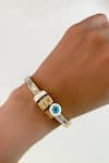 Buy PRERTO Gold Plated Smocking, Crystals Enamelled Evil Eye Bracelet at Aza Fashions Buy_PRERTO_Gold Plated Smocking, Crystals Enamelled Evil Eye Bracelet _at_Aza_Fashions