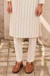 Nidhika Shekhar_Ivory Voile Embroidery Sequin Stripe Kurta Set _at_Aza_Fashions