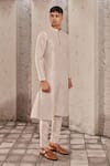 Shop_Nidhika Shekhar_Gold Tissue Plain Mandarin Collar Kurta Set _at_Aza_Fashions