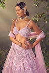 Aneesh Agarwaal_Purple Net Hand Embroidered Sequins Plunged Pastel Bridal Lehenga Set_Online_at_Aza_Fashions