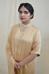 AHMEV_Beige Modal Silk Mandarin Collar Polished Straight Kurta Set _at_Aza_Fashions