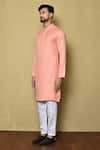 Shop_Arihant Rai Sinha_Peach Kurta Jacquard Silk Striped And White Pant Set _Online_at_Aza_Fashions