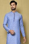 Arihant Rai Sinha Blue Kurta Jacquard Silk Striped Checkered Pattern And White Pant Set at Aza Fashions Arihant Rai Sinha_Blue Kurta Jacquard Silk Striped Checkered Pattern And White Pant Set_at_Aza_Fashions