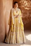 Buy_Mrunalini Rao_Yellow Paramita Hand Embroidered Lehenga Set With Cape _at_Aza_Fashions