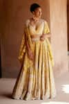 Buy_Mrunalini Rao_Yellow Paramita Hand Embroidered Lehenga Set With Cape _Online_at_Aza_Fashions